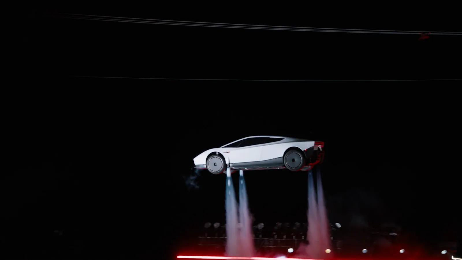 The new Tesla Roadster airborne on cold-gas thrusters at night