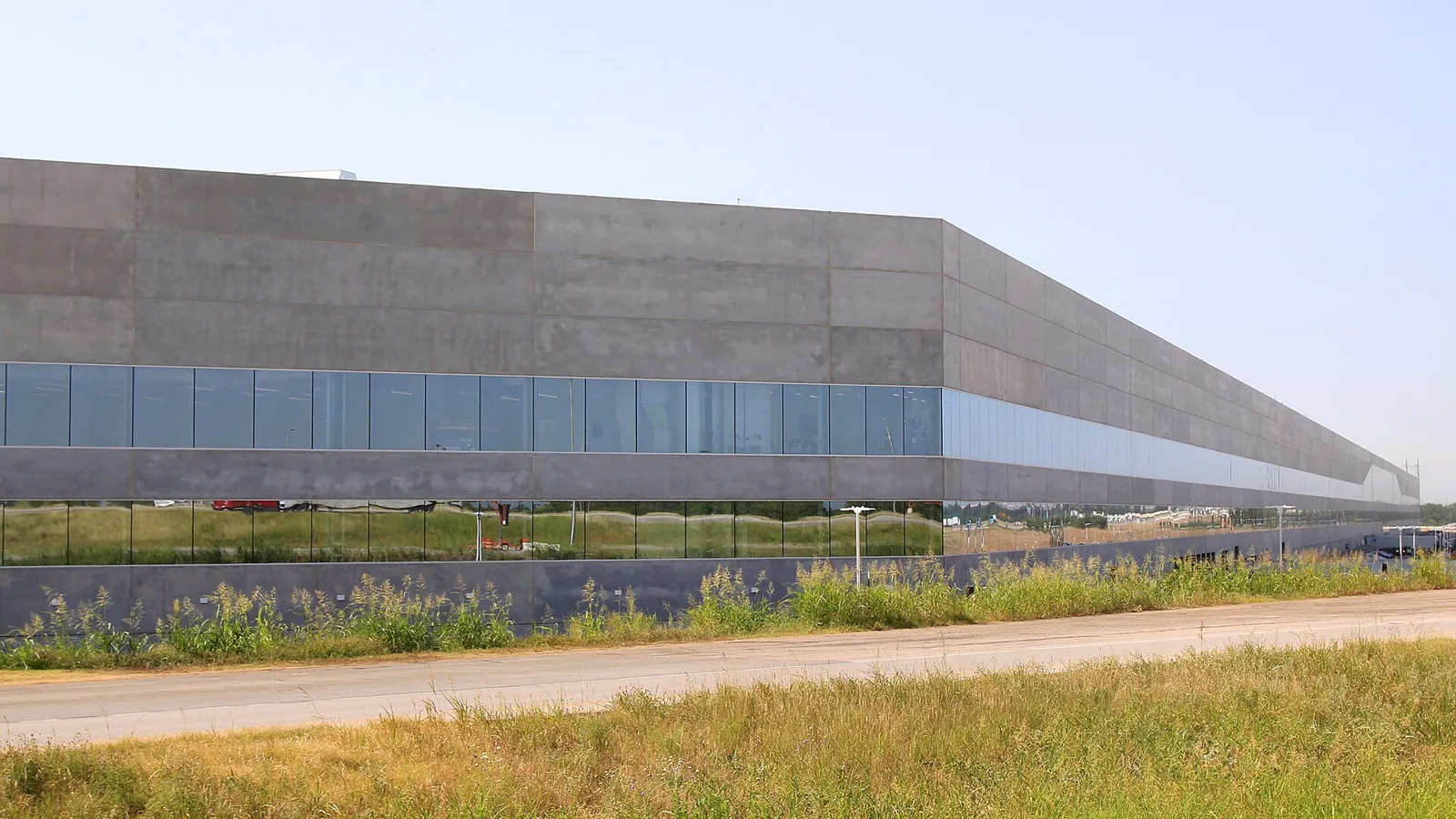 Exterior of Tesla Gigafactory Texas main building near Austin