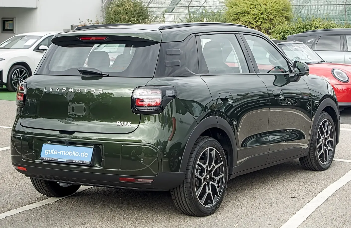 Rear three-quarter view of a dark green Leapmotor B03X